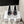 POINTED HIGH PUMPS IN WHITE PATENT CALFSKIN WITH CRYSTAL BUCKLE