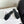 Petal Anagram Slide in Black Soft Calfskin 273512