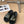 POOL GRAFFITI CROCS SLIDE SANDALS IN BLACK AND YELLOW RUBBER