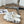 POOL GRAFFITI CROCS SLIDE SANDALS IN WHITE AND BLACK RUBBER