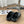 POOL GRAFFITI CROCS SLIDE SANDALS IN BLACK AND WHITE RUBBER
