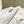 FLAT MULES IN WHITE SMOOTH CALFSKIN SILVER BUCKLE