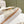 CC SLIPPERS WITH SILK BOW IN WHITE COWHIDE