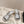 Alaia 2025 Vienne Cutout Kitten-Heel Slide Sandals Silver Leather 293647