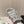 Alaia 2025 Vienne Cutout Kitten-Heel Slide Sandals Silver Leather 293647