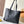 LOW KEY CABAS 47 IN BLACK GRAINED CALFSKIN GOLD BUCKLE