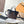 NEVERFULL BANDOULIÈRE INSIDE OUT BB 24 IN BROWN MONOGRAM CANVAS AND BLACK CALFSKIN