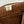16 STRAP POCHETTE 18 IN BRONZE ORANGE SUPPLE CALFSKIN GOLD HARDWARE