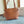 SMALL CABAS ANAÏS CUIR TRIOMPHE 28 IN BRONZE ORANGE GRAINED CALFSKIN
