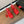 ALAIA BANQUET WEDGE SANDALS IN CHERRY RED LAMBSKIN WITH RED HEART
