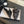 BIG BOW FLAT MULE SANDALS IN BLACK SILK
