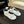 FLAT SANDALS IN WHITE LAMBSKIN WITH GOLD CHAIN