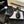 T-STRAP PEARL HEEL 85 MM SANDALS IN BLACK LAMBSKIN