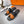 HM Oran Slippers in Black and Orange Calfskin 735648