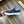 LV TRAINER SNEAKER IN BLACK MIX COBALT BLUE DENIM