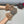 GLOVES WITH BOW IN HAZELNUT BEIGE MIX BLACK WOOL AND RABBIT FUR 453760