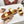 TWO-STRAP SANDALS IN GOLD CALFSKIN