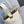 LOE MINI PEBBLE 20 BUCKET BAG IN WHITE GRAINED CALFSKIN