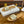 cd slide gold metalic calfskin embroidered cotton