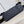 MESSENGER VOYAGER PM 33 IN BLACK MONOGRAM SHADOW CALFSKIN