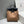 HERBAG A DOS ZIP RETOURNE BACKPACK 29 IN BROWN CANVAS AND BLACK CALFSKIN
