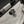 HERBAG A DOS ZIP RETOURNE BACKPACK 29 IN OFF-WHITE MIX BLACK CANVAS AND CALFSKIN