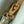 capucines mm 31.5 green beige taurillon leather gold hardware