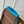 GASTON WEARABLE WALLET 18 IN BROWN MONOGRAM CANVAS MIX SKY CALFSKIN