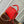 CAPUCINES MINI 23 IN RED TAURILLON GOLD HARDWARE