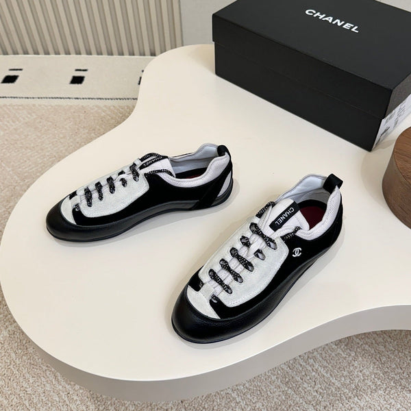 CC Métiers d’art 2026 Sneakers Black White Calfskin 859565