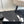 cross puffy slippers beige black lycra fabric