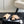 cross puffy slippers beige black lycra fabric