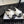 cross puffy slippers white black lycra fabric