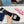 PRA SAFFIANO PATENT SLIDES OSTRICH MOTIF PINK CALFSKIN