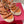 Rockstud Ankle Strap Wedge Sandal In Yam Orange Calfskin Leather And Beige Raffia 100mm 829390