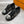 LV TRAINER SNEAKER BLACK CALFSKIN AND FABRIC