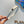 HAIR BAND IN WHITE COTTON ATTACHED PEARL CHAIN 418900