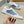 LV TRAINERS IN WHITE CALFSKIN AND SAPPHIRE BLUE JACQUARD