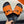 HM Oran H Black Buckle Slippers in Orange Cowhide 735250