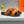 HM Oran H Black Gold Buckle Slippers in Orange  Cowhide 735253