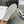 TRAINER LOW LACE-UP SNEAKER IN CALFSKIN, LAMINATED CALFSKIN AND SUEDE CALFSKIN OPTIC BLACK WHITE