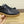 LV TRAINERS IN BLACK CALFSKIN AND BROWN RUBBER