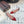 ALAIA FLAT SLINGBACK IN CHERRY RED PATENT CALFSKIN AND FILM