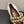 ALAIA BALLET FLATS IN WHITE GLOSSY CALFSKIN WITH GOLD HARDWARE
