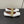 ALAIA BALLET FLATS IN WHITE GLOSSY CALFSKIN WITH GOLD HARDWARE