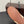 ALAIA BALLET FLATS IN COPPER BROWN MESH FISHNET WITH GOLD HARDWARE