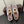 ALAIA BALLET FLATS IN WHITE MESH FISHNET WITH GOLD HARDWARE