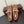 ALAIA BALLET FLATS IN COPPER BROWN MESH FISHNET