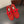 ALAIA BALLET FLATS IN CHERRY RED MESH FISHNET