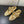ALAIA SPHERE BALLET FLATS IN GOLDEN LAMBSKIN